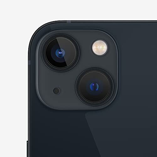 Close-up of a smartphone's dual camera setup.