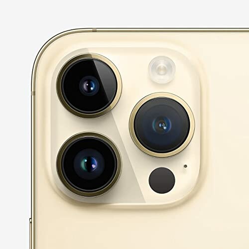 Close-up of a smartphone camera lens with three lenses and a flash.